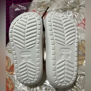 Size: J1 brand new white platform crocs